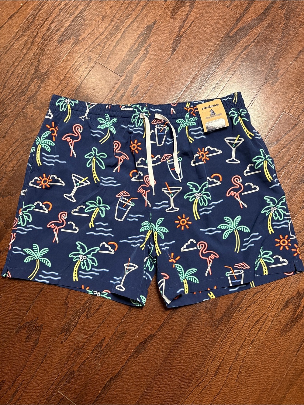 chubbies The Neon Lights Navy Swim Shorts with Neon Tropical Icons